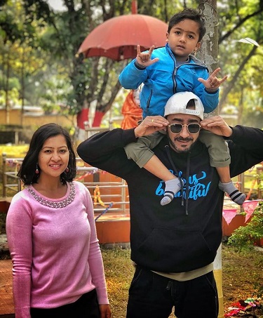 Girish with his wife and son